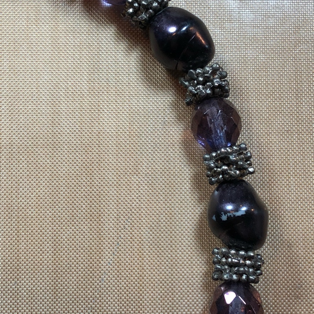 Purple beaded necklace.